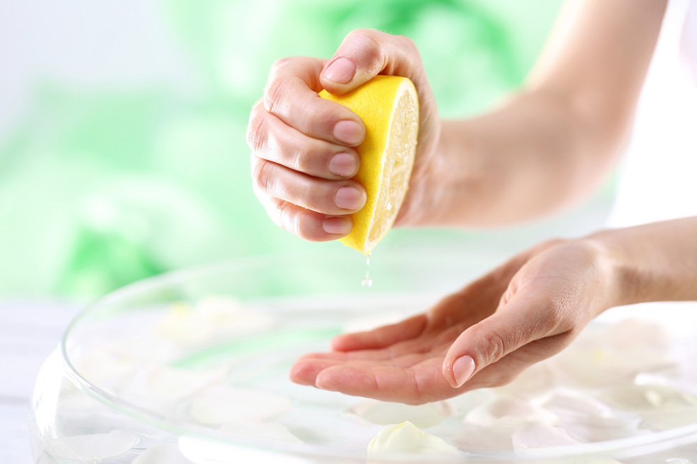 Lemon Person squeezing a lemon