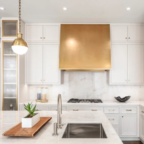 Michael London Design Hazelton Hotel private residence interior with all white kitchen and gold accents by Michael London Design
