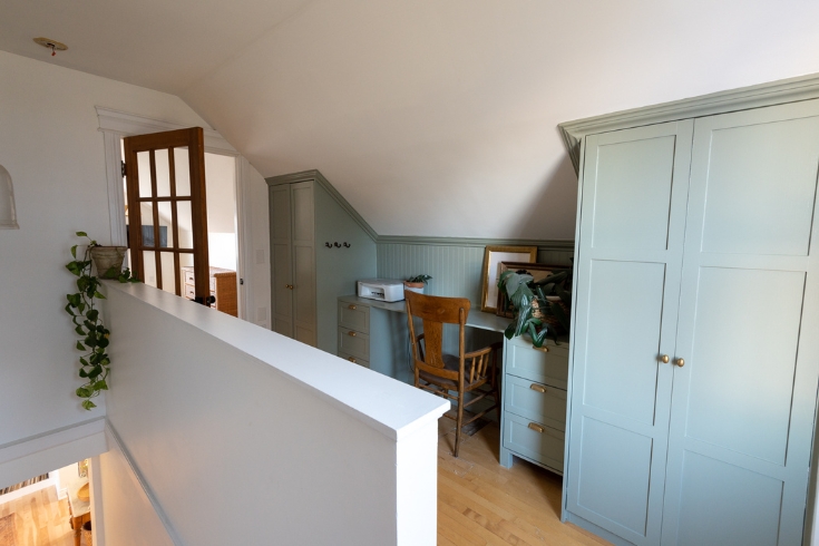 Space Exploration An office alcove on an upstairs landing with built-in closets on either side