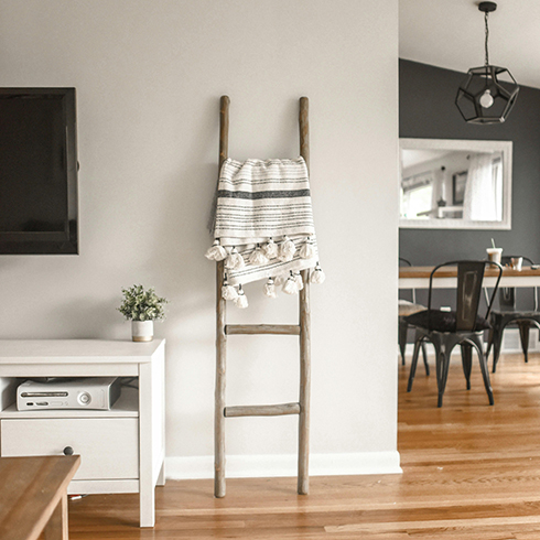 Wood Shot of living room and dining room with light hardwood flooring