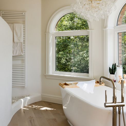 Bathing in Bubbles Bathroom with arched windows