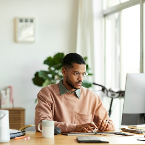 Have Something Solid Behind You Freelancer Using Computer At Home Office