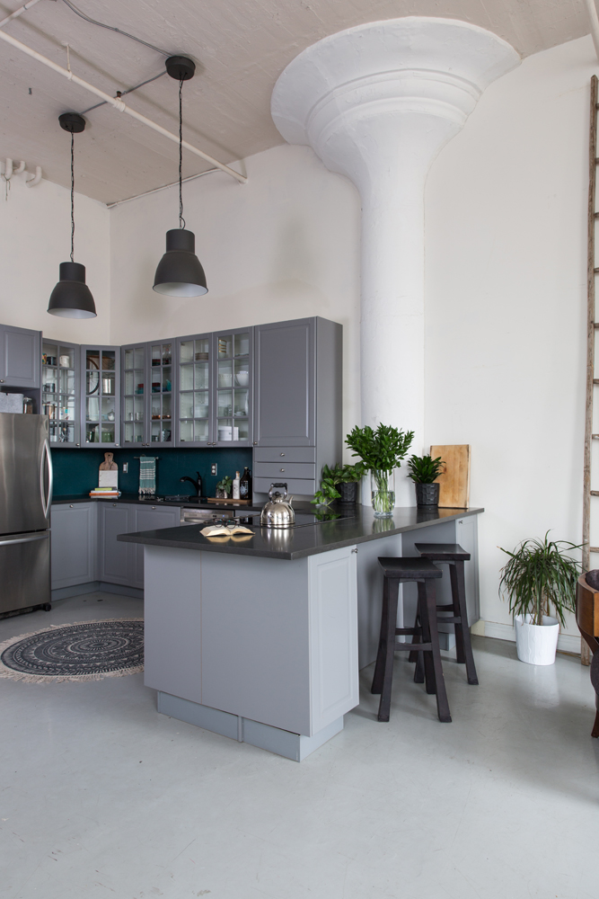 Colour Me Happy grey cabinets in white loft kitchen
