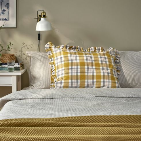 Sunny Cheer Yellow plaid pillow in bedroom