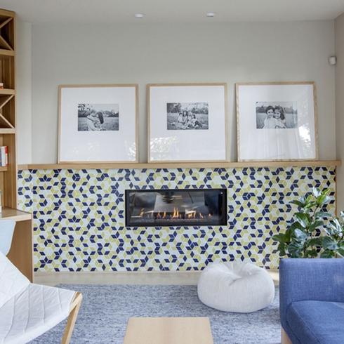 Quirky Tiles Living room with colourful tiles, framed art and a fireplace