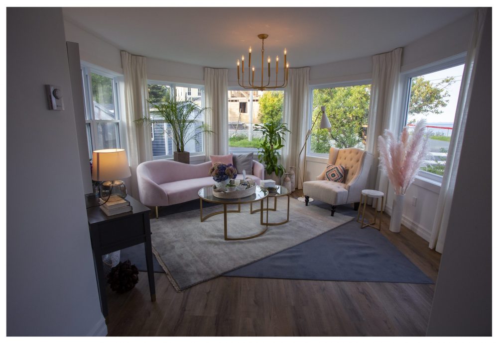 Sitting Space curved pink couch in sitting room