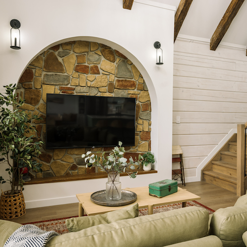 Stunning Stonework Stone fireplace with custom arch
