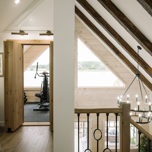 Lofty Ambitions Loft gym in an A-frame structure
