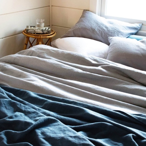 10. Rough Linen A beautiful linen duvet cover on a bed by Rough Linen