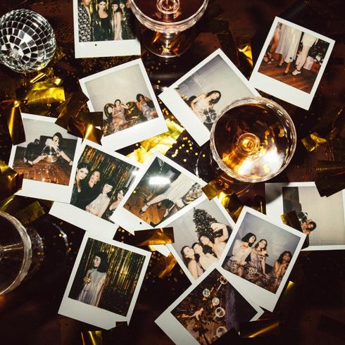 You Ask Guests to Pay Up Polaroid photos with new year's decorations