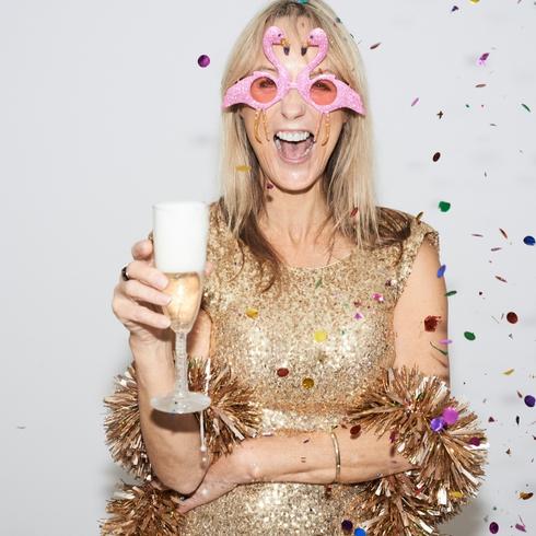 You’re Hitting the Bottle Harder Than Your Guests Person dressed for New Year's eve party