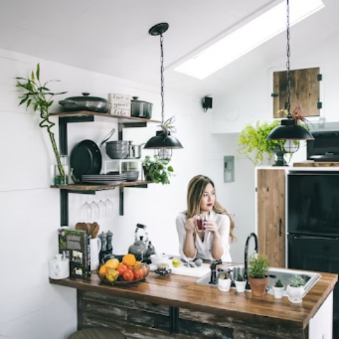 Open Shelving Equals Open Book Kitchen with open shelves and plants