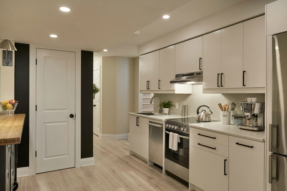 Recessed Lighting Basement apartment featuring recessed lighting throughout the ceilings.