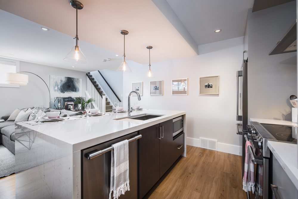 High Ceilings Basement apartment living room featuring modern and contemporary furnishing.