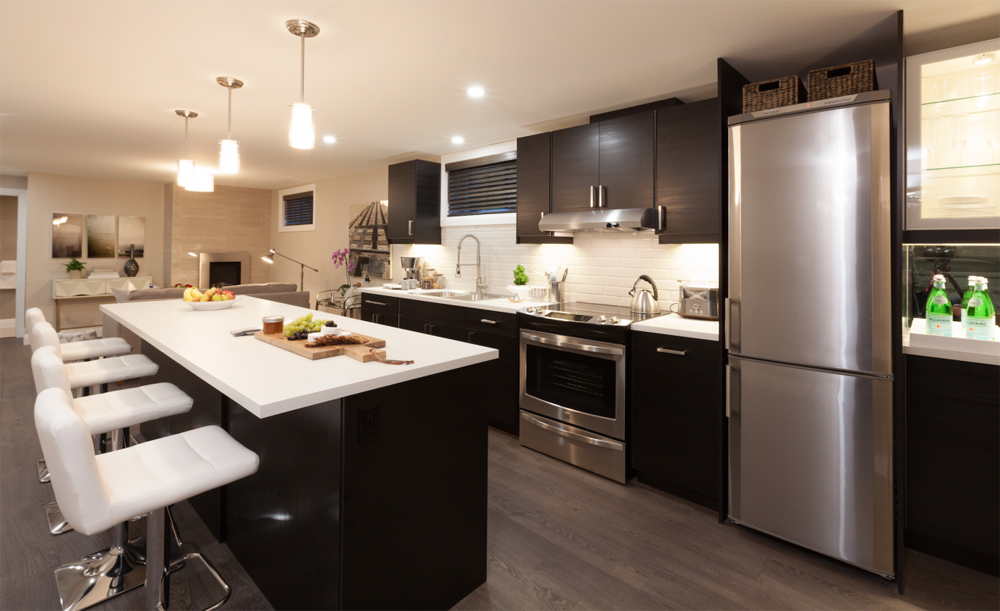 Full Kitchen Basement apartment featuring a beautiful kitchen with stainless steel appliances.