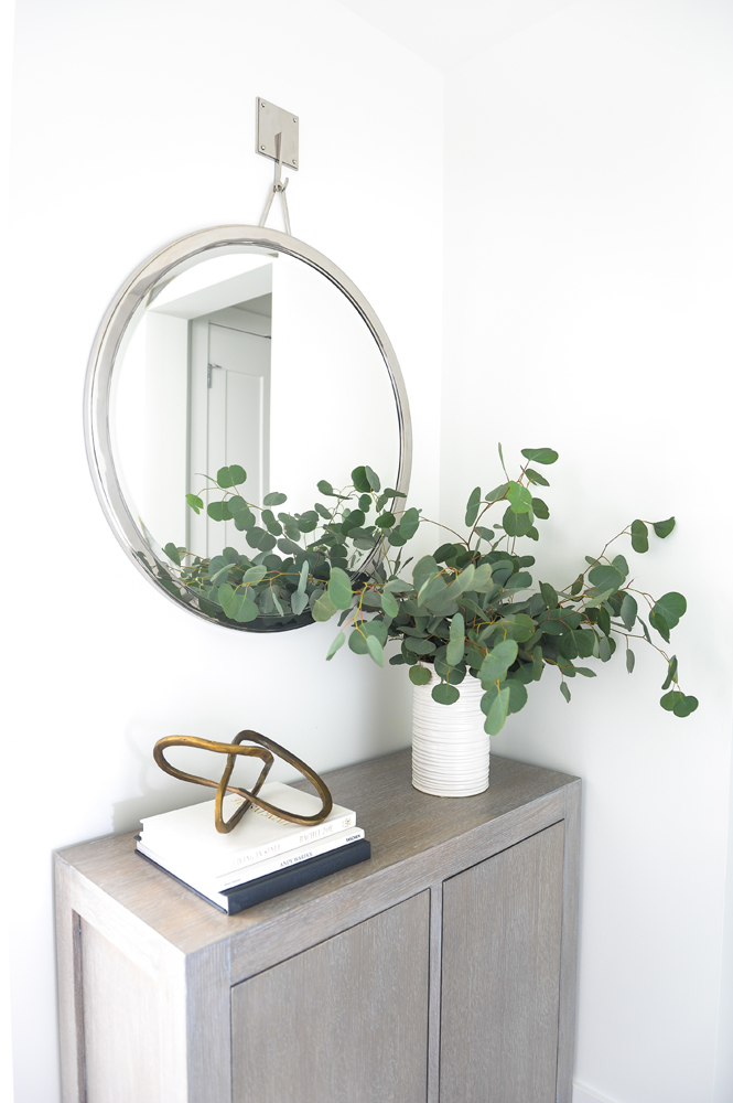 Add a Cabinet Small foyer with cabinet and objects