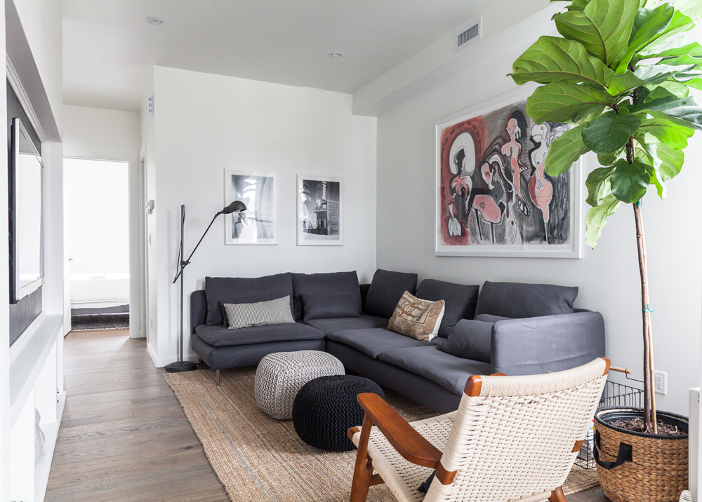 Stay Neutral A neutrally coloured living room with dark furniture in a small space