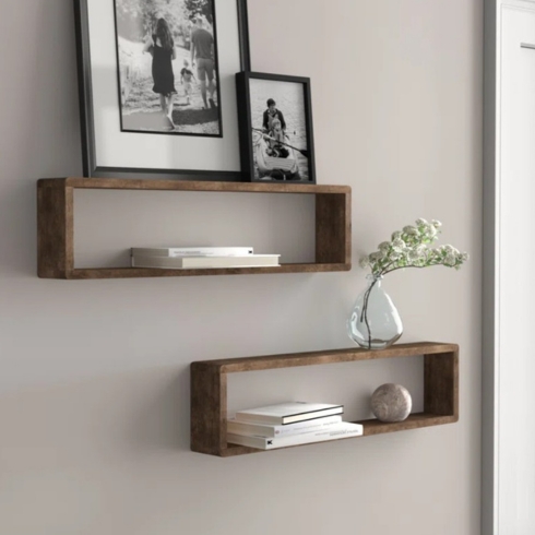 Go Vertical With Floating Shelves Two pieces of rectangular wood floating shelves on the wall.