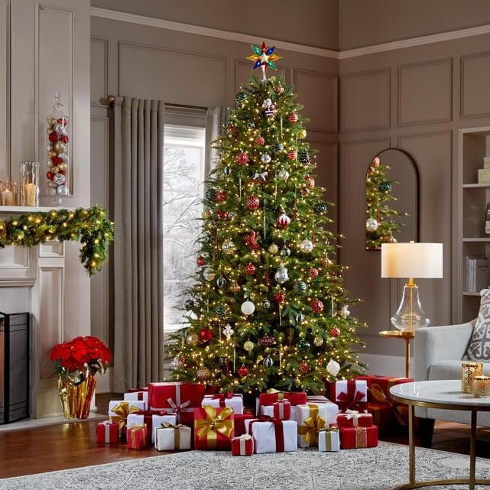 A Viral Sensation A classic Balsam Fir artificial Christmas tree with white and red decorations