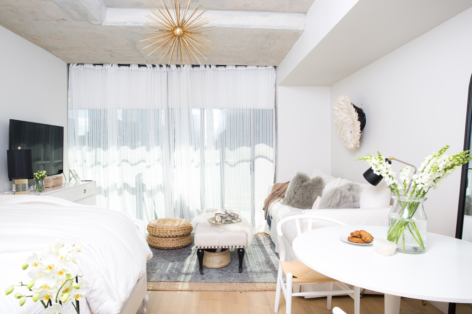 The Sweet and Petite Studio A feminine home in a concrete studio apartment