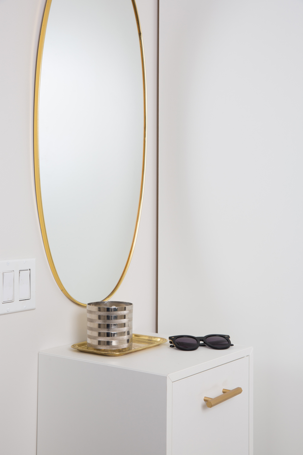 Grand Plans for a Small Foyer Floating console table under an oval mirror