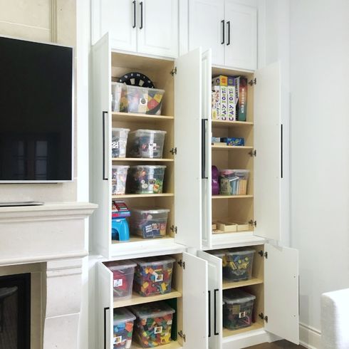 Organize the Insides, Too Custom built-in cabinets in living room