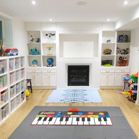 A Calming Basement Playroom: Not an Oxymoron Basement playroom with built-in shelvingF