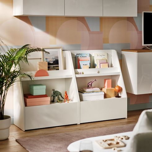 Sweetly Does It Toy and book storage shelves in living room