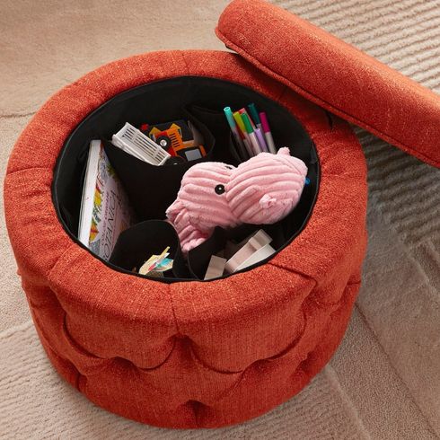 Stuff it, Then Shut it A multipurpose pouf for storage and sitting