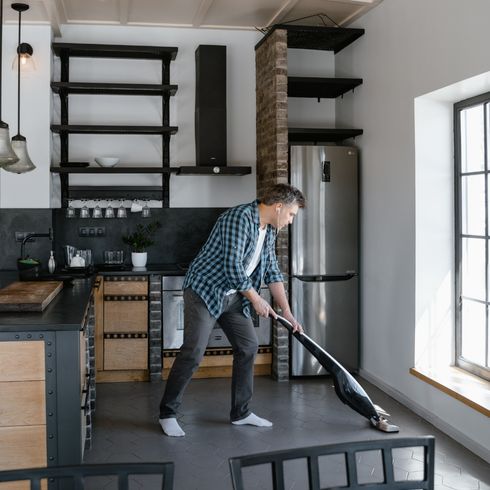 Weekly Cleaning Man cleaning his floors