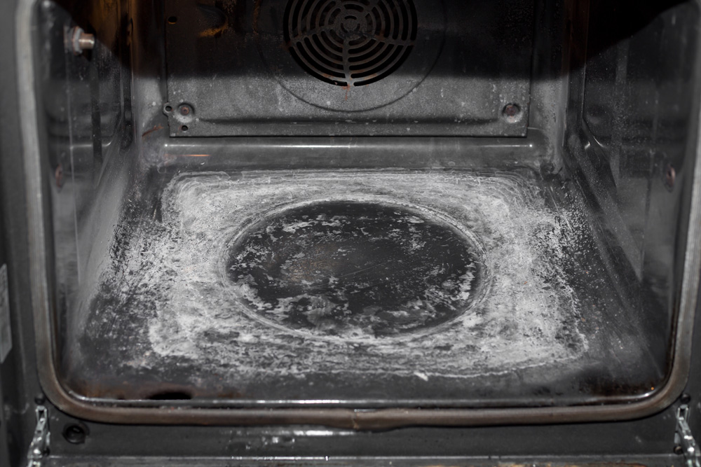Wipe Out the Ashes Self-cleaning oven interior