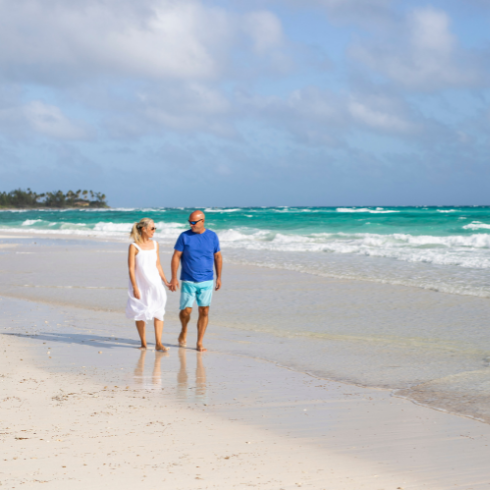 His Hidden Talent Bryan and Sarah walking on an empty beach.