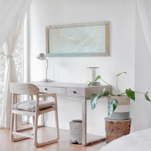 Lighten up Your Furniture light-wood desk and chain in white bedroom
